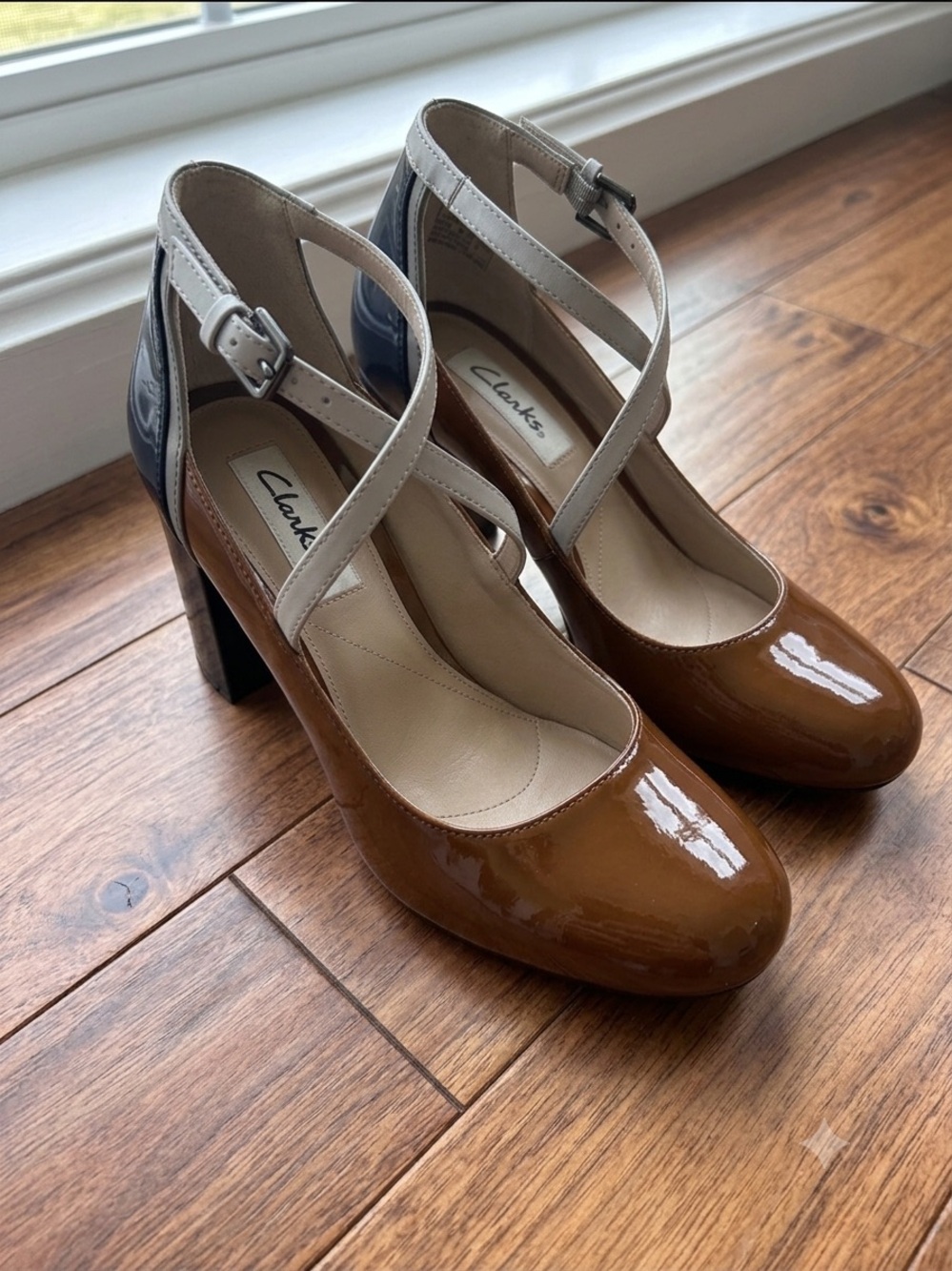 Clarks Brown Patent Leather Pumps with Cream Cross-Strap and Navy Heel